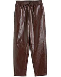 2KStyle - Lizzy Tapered Elasticated Faux Leather Trousers - Lyst