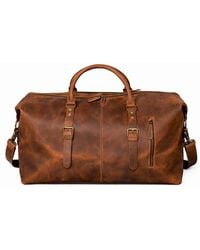 Touri - Extendable Leather Travel Bag - Lyst