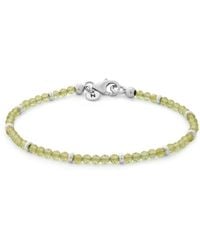 Nellou Jewellery - Peridot Orbit Bracelet - Lyst