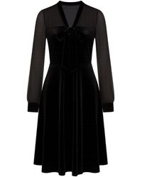 Yumi' - Velvet Pussy Bow Sheer Sleeves Skater Dress - Lyst