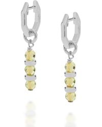 Nellou Jewellery - Linear Huggie Birthstone Earrings August Sterling - Lyst