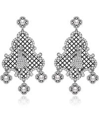 Retro Chic - Nutcracker Earrings - Lyst