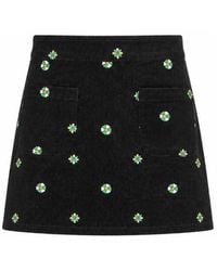 Yumi' - Flower Embroidered Cord Mini Skirt - Lyst