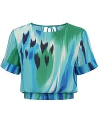 Conquista - Elegant Printed Net Top With Open Back & Tie Detail - Lyst