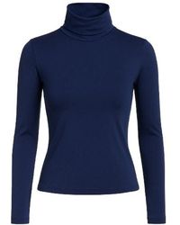 Conquista - Dark Turtle Neck Top By - Lyst