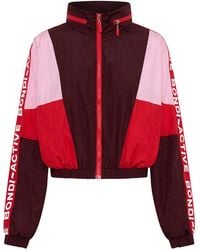 Bondi Active - Forma Cropped Windbreaker Hoodie - Lyst
