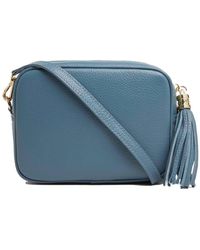 Betsy & Floss - Verona Crossbody Tassel Bag In Denim With Pastel Strap - Lyst