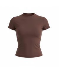 Loom Archives - Day Flow Longline Short Sleeve Top - Lyst