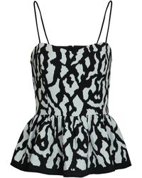 2KStyle - Kate Animal Print Jacquard Peplum Top - Lyst