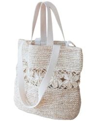 LIKHÂ - Neutrals Handwoven Raffia Tapered Tote Bag – Flower Weave - Lyst