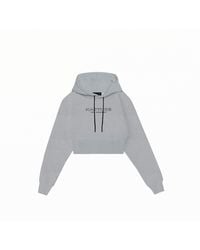Kapture - Travel Logo-Print Cropped Hoodie - Lyst