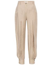 SÉLONE - Nessa Pleated Balloon Trousers - Lyst