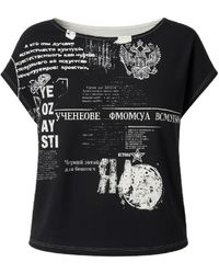 Conquista - Graphic Print Top With Modern Street Style - Lyst