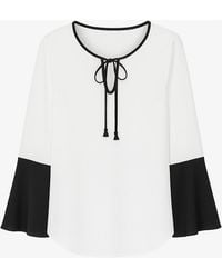 Conquista - Neutrals Contrast Detail Ecru Top With Long Bell Sleeves & Keyhole Tie Fastening By Fashion - Lyst