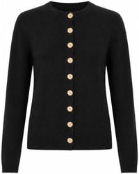 Yumi' - Knitted Fitted Peplum Cardigan - Lyst