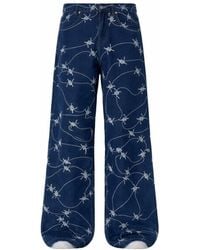Born in Exile - Embroidered Stitched Denim Pants - Lyst
