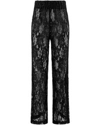 Tia Dorraine - Glowing In The Dark Sheer Lace Flared Trousers - Lyst