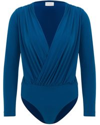 Maan Istanbul - Deep V-Neck Bodysuit - Lyst
