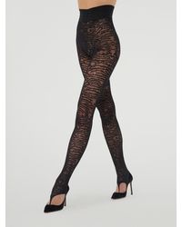 Wolford - Trace Net Stirrup Tights, Femme, , Taille - Lyst