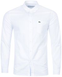 all white lacoste shirt