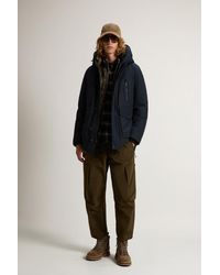 Woolrich - Arctic Parka Evolution Van Ramar Cloth Blauw Grootte - Lyst