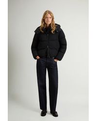 Woolrich - Donsjack Madison Van Elastisch Nylon Met Afneembare Capuchon Zwart Grootte - Lyst