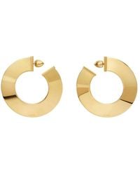 Alaïa - "Blade" Rounded Earrings - Lyst