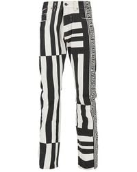 Versace - Denim Jeans With Sylvester Print - Lyst