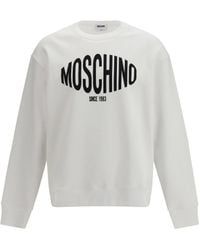 Moschino - Printed Organic Cotton Sweatshirt - Lyst