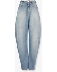 Alaïa - Faded Denim Jeans - Lyst