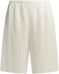 KHAITE - Poppy Formal Shorts - Lyst