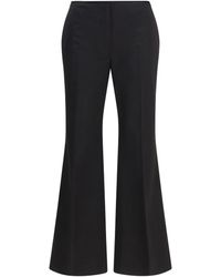 TOTEME - Kick Flare Raw-Edge Pants - Lyst