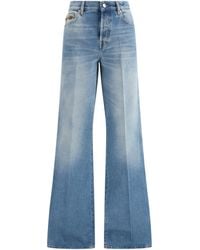 Gucci - Cotton Denim Flare Jeans - Lyst