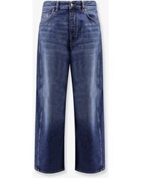 Givenchy - Twisted Stone-Washed Denim Jeans - Lyst