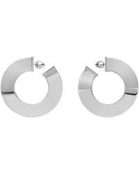 Alaïa - "Blade" Rounded Earrings - Lyst