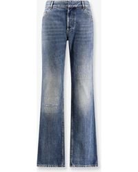 Dior - Dior Regular Fit Stone-Washed Denim Jeans - Lyst