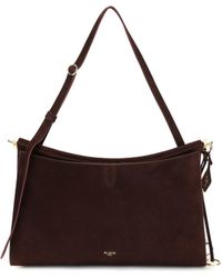 Alaïa - Alaïa Le Click Pocket Shoulder Bag - Lyst