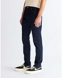 Wrangler - Larston Slim Tapered Low Stretch Jean Size 27 X32 - Lyst
