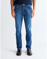 Wrangler - Larston Slim Tapered High Stretch Jean Size 27 X32 - Lyst