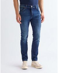 Wrangler - Larston Slim Tapered Low Stretch Jean Size 27 X32 - Lyst