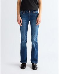 Wrangler - Low Rise Bold Boot Jean Size 24 X30 - Lyst