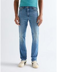 Wrangler - Texas Slim Toughlite Low Stretch Jean Size 30 X32 - Lyst