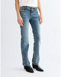 Wrangler - Low Rise Bold Boot Jean Size 24 X30 - Lyst
