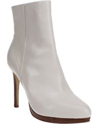 nine west querida platform booties