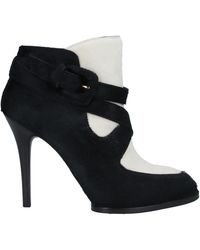 Tod's - Botines de caña alta - Lyst