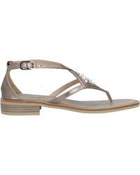 Womens Shoes Flats and flat shoes Flat sandals Metallic Nero Giardini Leather Timma Sandals in White 