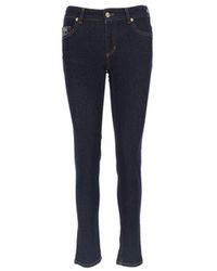 Versace - Pantalon en jean - Lyst