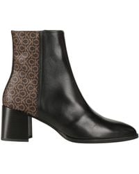 Calvin Klein - Botines con monograma estampado - Lyst