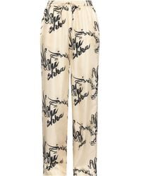 Nanushka - Ivory Pants Silk - Lyst