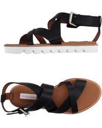black ferragamo flip flops
